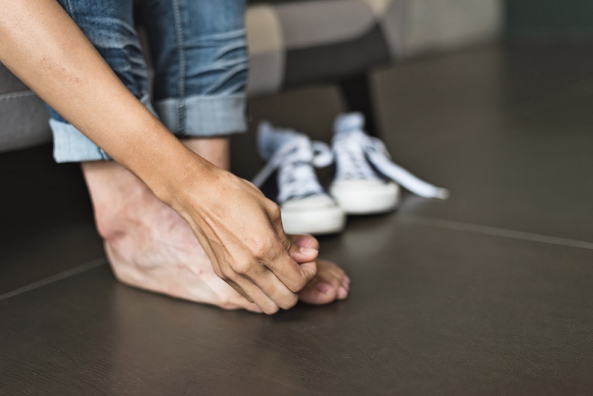 Man checking his toes